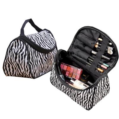 China Fashionable 2022 Women Leopard Zebra Zipper Pouch Make Up Organizer Beauty Cosmetic Bag Tote Bag Travel Nylon Washing Makeup Bag for sale