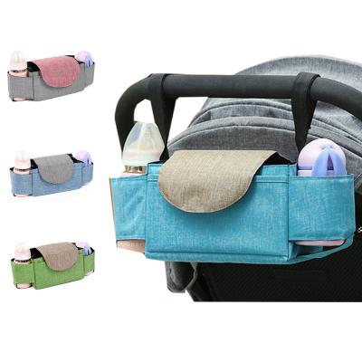 China Multifunctional Hanging Baby Stroller Storage Bag Milk Bottle Water Cup Holder Large Capacity Diaper Bags Water Resistant Baby Diaper Bags Storage Mommy Bag for sale