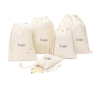 China Eco Friendly Organic Recycle Logo Muslin Cotton Pouch Trendy Custom Canvas Printed Cotton Canvas Small Drawstring Bag for sale