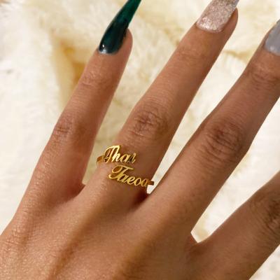 China Custom Made Flower Environmentally Friendly Name Month Ring Stainless Steel Letter Adjustable Ring Jewelry For Women Birthday Gift for sale