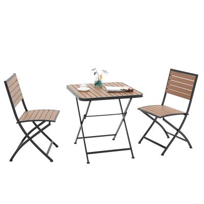 China Modern outdoor outdoor portable wrought iron balcony table and chair combination table and chair folding for sale