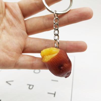 China Novelty Creative Eco-friendly Simulation Food Key Chain 3D Roasted Sweet Potato Key Chain Bag Pendant for sale