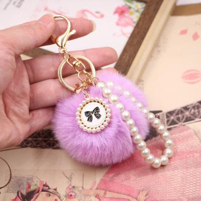 China Eco-Friendly Creative Cute Pearl Ball Faux Fur Pom Pom Keychain Bag Pendant Car Key Chain for sale