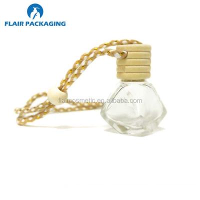 China Empty personal care perfume glass bottle for car for sale