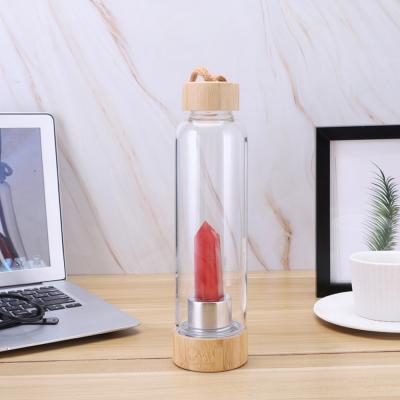 China 540ml Viable Crystal Bamboo Lid Gemstone Quartz Energy Borosilicate Glass Natural Water Bottle for sale