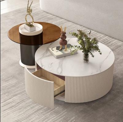 China Modern minimalist round coffee table TV cabinet home living room rock light luxury slab coffee table for sale