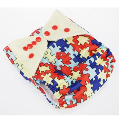 China Printed Baby Cloth Diapers Quilting Ear Double Row Button Printing Red Puzzle Pattern Baby Diapers for sale