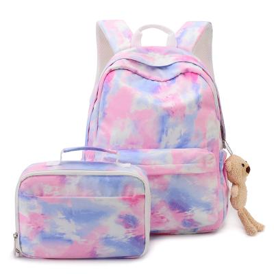 China Korean donut waterproof backpack primary school female backpack to reduce the burden of ridge students backpack for sale