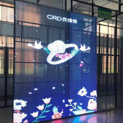 China Indoor Full Color Transparent Glass Wall Video Screen Transparent LED Curtain Screen Led Display for sale