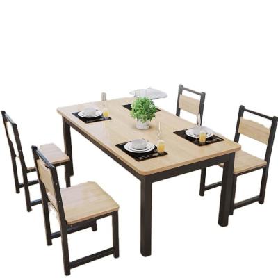 China Optional Glass Top Dinning Table Set with Solid Wood Table and Modern Metal Chairs for sale