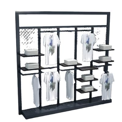 China Moderne metalen kledinghanger vloer display racks voor boetiekwinkels Te koop