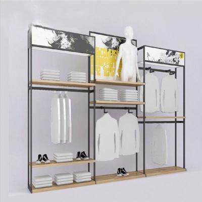 China Wall Hanging Heavy Duty Clothing Display Rack Modern Stainless Steel Supermarket Rack for sale