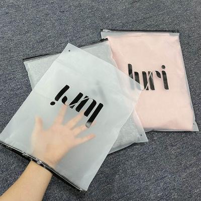 China Customized White Matte Frosted Peva Zipper Slider Plastic Bags Waterproof With Your Logo For Clothing Hoodies Packaging for sale