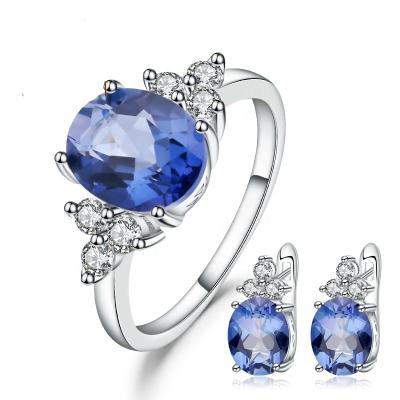 China Fashion Environmental Friendly Oval Cut Mystic Blue Iolite Quartz Gemstone Earrings Ring Set Wedding Jewelry for sale