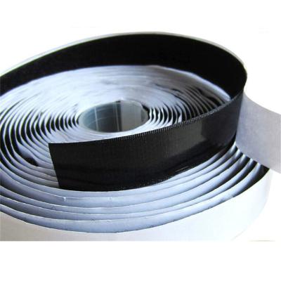 China 50mm durable 100% polyester heat resistance black and white durable hook and loop adhesive tapes for curtains for sale