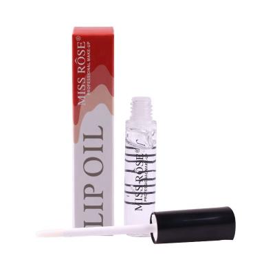 China OEM Logo Color Kiss Beauty Lip Oil Waterproof Private Comfort Glaze Seasoning Magic Roller for sale