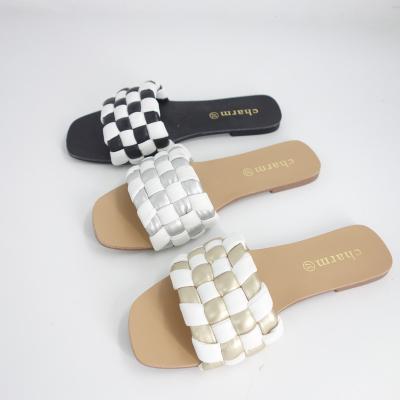 China Fashion Trend New Fashion Woven Breathable Flat Slippers for sale