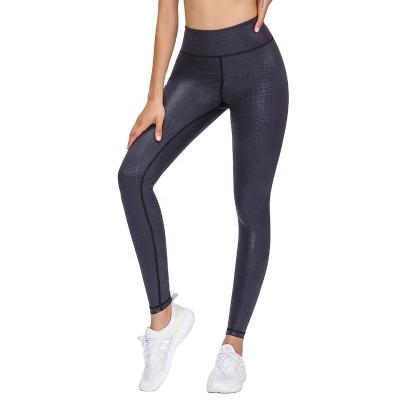 China 2021 Breathable Hot Selling Embossed Hip Lifting High Waist Pants Exercise Yoga Pants Tights Gaiters For Women for sale