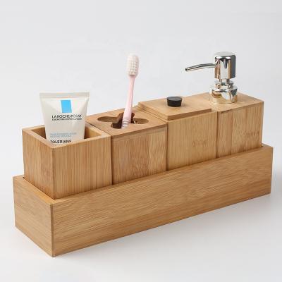 China 5 Pieces Sustainable Bathroom Accessories Bamboo Organization Set With Bamboo Towel Tray Toothbrush Holder Storage Box Lotion Bottle for sale