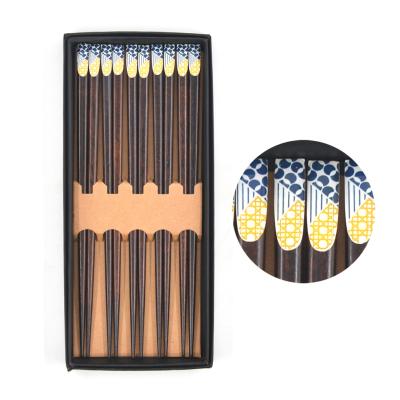 China Viable 5 Pairs Set Light Japanese Korean Style Natural Flowers Printing Wooden Reusable Chopsticks With 8.8 Inches/22.5cm for sale