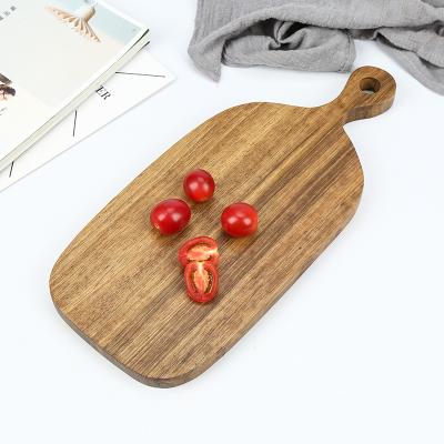 China Viable Wholesale Irregular Wooden Kitchen Pallet Acacia Serving Board Large Cutting Board Tray with Handle for Cake Pizza Steak for sale