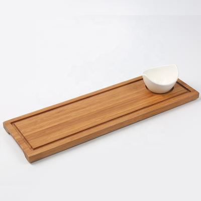 China Wholesale Bamboo Wooden Rectangle Kitchenware Juice Groove Cutting and Serving Board Tray with Ceramic Dip Bowl for Cheese Bread Snack for sale