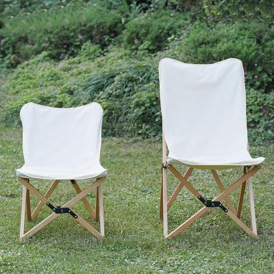 China Modern Design Canvas Butterfly Chair Wood Frame Simple Foldable Portable Beach Chairs for sale