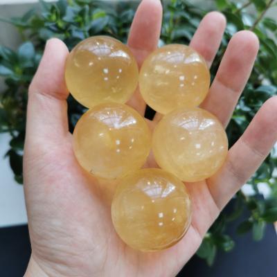 China 3cm Sphere Crystal Spheres Crystal Ball Yellow of Europe natural stone calcite crystals small for healing for sale