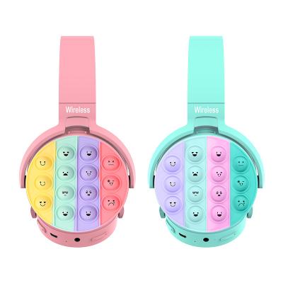 China new design Head-mounted smiley face silicone poppings its push it bubble fidgety person toy set wireless bluetoothings headphones for girl woman use for sale