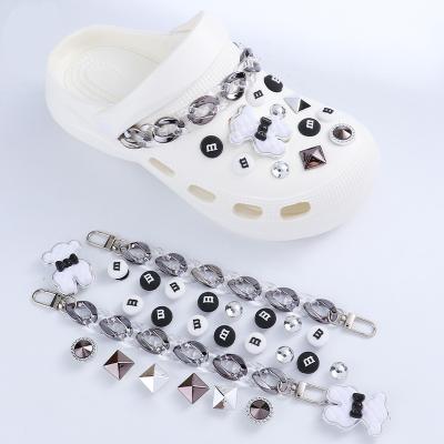 China New Durable DIY Cartoon Panda Clogs Shoes Letters PVC Shoe Flower For Croc Charms Garden for sale