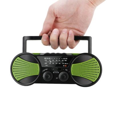 China AM/FM/NOAA Times Band 100,000 Band Portable Solar Powered Fm Radio MP3 Player With Light for sale