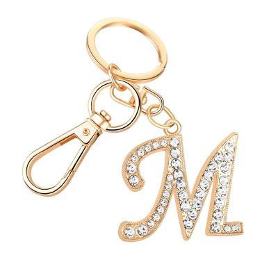 China 2021 custom metal rhinestone diamond metal promotion logo products gold letter pendant initial key chains alphabet M alphabet keychain for sale