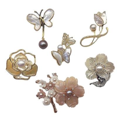 China Central Institute of Statistics romantic hot-selling style pearl customs brooches designer brooches and pins brooches white women for sale