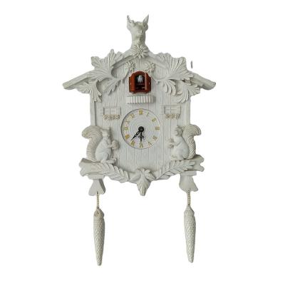 China Living Room Antique European Style Cuckoo Song Light Style Hanging Wall Clock for Home Decoration for sale