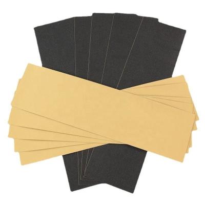 China Custom Black Waterproof Anti Slip Non Perforated Skateboard Griptape for sale