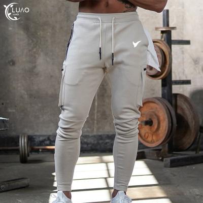 China High Quality Cotton Quick Dry Men's Breathable Pants With Side Pockets And Towel Design Sweat Wicking Fitness Wear For Outdoor Sport for sale