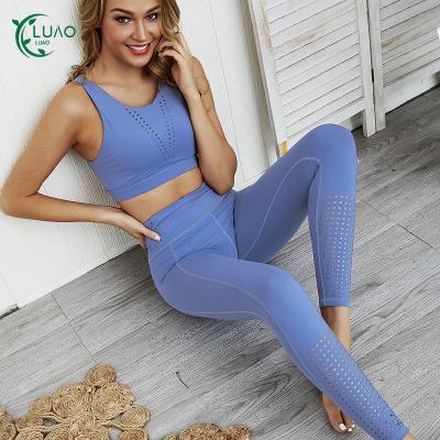 China Hygroscopic Yoga Suit Women's Pure Yoga Fitness Suit Women's Breathable Mesh Color Shrinkage Exercise Suit for sale