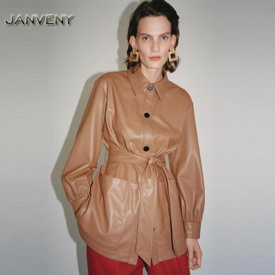 China JANVENY 2022 New Autumn Winter Casual Lapel Belt Artificial Leather Shirt Jacket Women QUICK DRY Single Buttons Sheath Long Soft PU Coat for sale