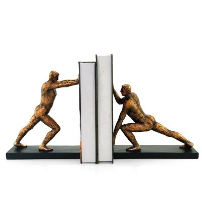 China Gold Modern Abstract Bookends Decoration Figurine Resin Statue Mid Century Man Character Crystal Bookends for sale