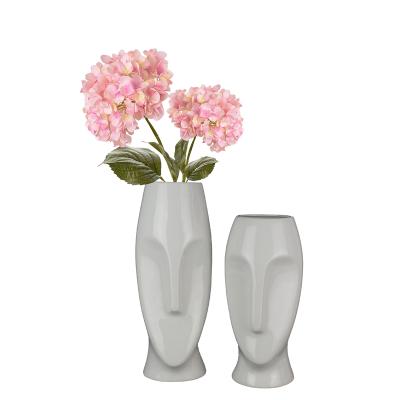 China Friendly Wholesales Human Body Piece Face Imitation Ceramic Flower Vase For Home Decor for sale