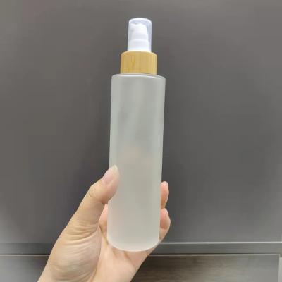 China High Quality Frosted Wood Grain Cover Cap Body Lotion Spray Bottle for sale