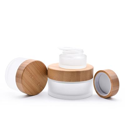 China 1PCS 5g 15g 30g 50g 100g Face Cream Cosmetic Empty Clear Frosted Glass Jar With Bamboo Lid for sale