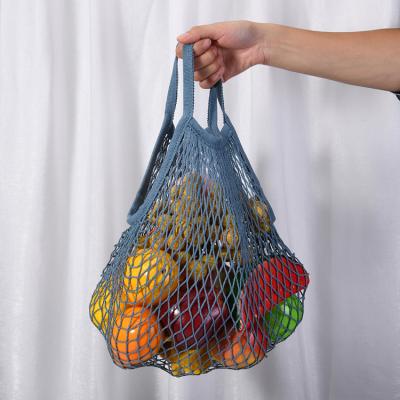 China Recyclable Net Bag Vegetables Packing Pouch Fruit Packaging Bags Washable Reusable Shopping Mesh Drawstring Pouch for sale