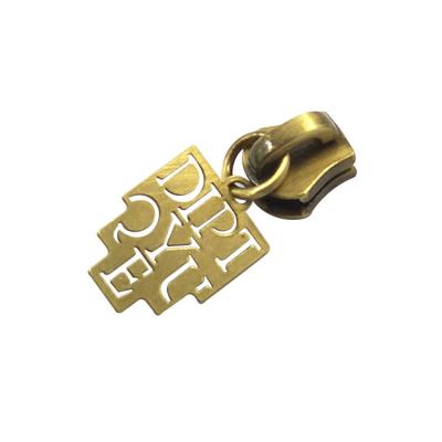 China Letters Metal Logo Metal Zipper Puller Customized Nickel Free Brushed Bronze Hollowed Out Zipper Slider for sale