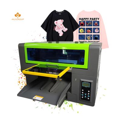 China Garment shops new design 3d a2 a3 a4 2400dpi dtg cotton t-shirt diy inkjet printer with mesin dtg print printing for t-shirt for sale