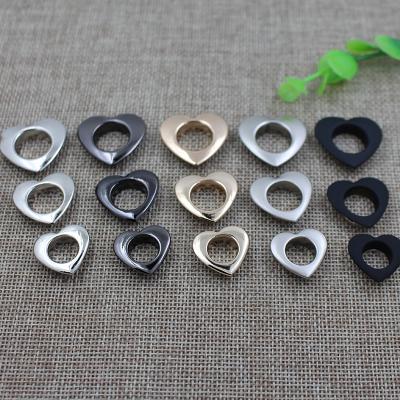 China Factory wholesale eco-friendly fashion metal heart shaped garment supplies eyelets for bag for sale