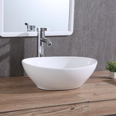 China Easy Clean Hot Clean Oval Bathroom Vessel Sink Table Shape Table Top Sundowner Wash Basin Ceramic Sink for sale