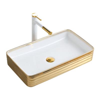 China Clean Easy Emboss White Gold Basin Sink Bathroom Table Top Lavabo Modernos Dorado Vessel Sink Gold Rim for sale