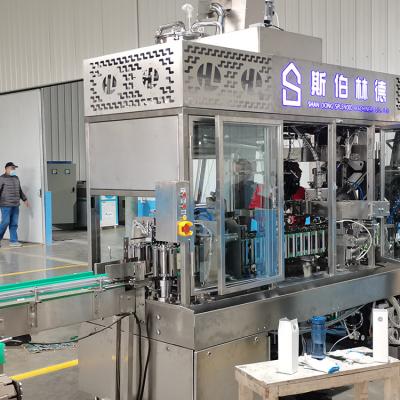 China Beverage Packing Box Gable Top Box Liquid Filling Machine Automatic Liquid Seal Filling Machines for sale