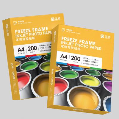 China 150g Photo Paper A4*50 Sheets Inkjet Melt Paper Instant Dry Self Adhesive Glossy Coated Photo Paper Sticky Photo Paper for sale